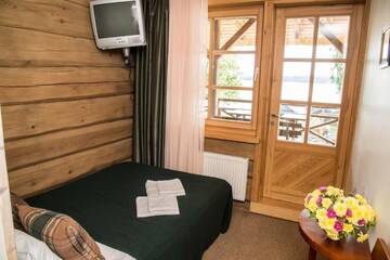 Фото номера Стандартный двухместный номер с 1 кроватью Отель Porto Resort г. Лиласте 2