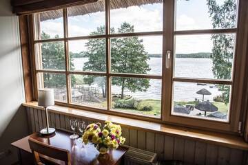 Фото номера Улучшенный двухместный номер с 2 отдельными кроватями Отель Porto Resort г. Лиласте 2